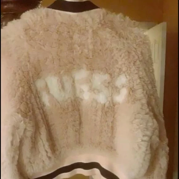 Guess fur jacket size small almost like new wore it once .